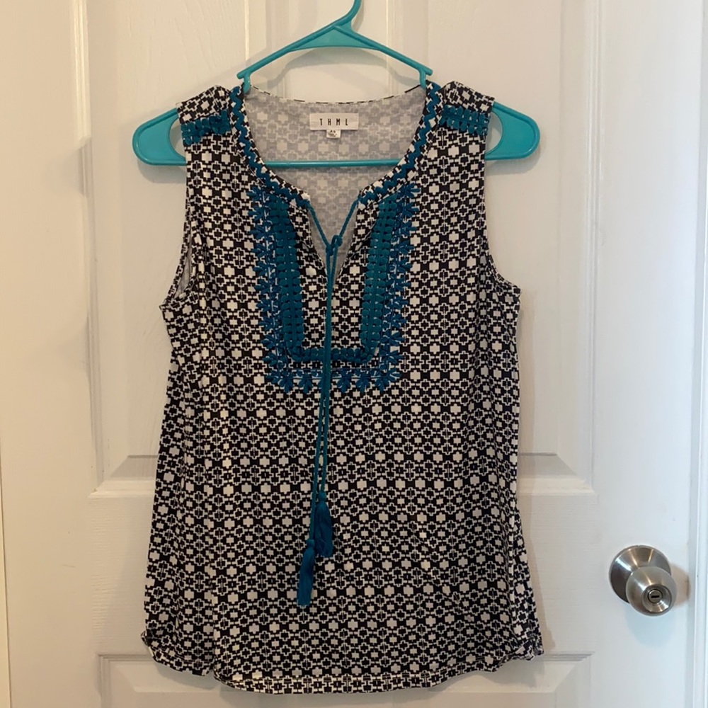 Cute tank top, worn only a few times.